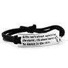 LIFE ISNT ABOUT SURVIVING THE STORM Inspirational Leather Bracelet