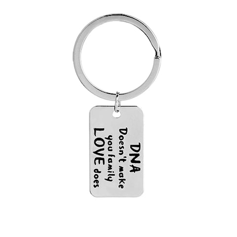 DNA DOESNT MAKE YOU FAMILY LOVE DOES Family Keychain