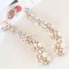 Touching Pearls Drop Earrings