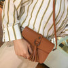 Tassel and Ring Leather Sling Bag