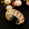 Cut Triangles Braided Cuff